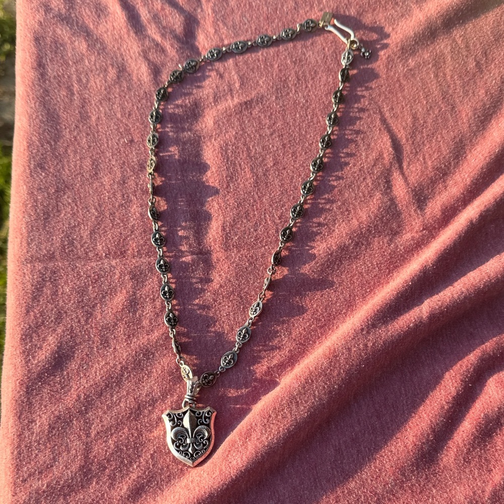 Ornate Silver Shield Pendant Necklace - Black Accents